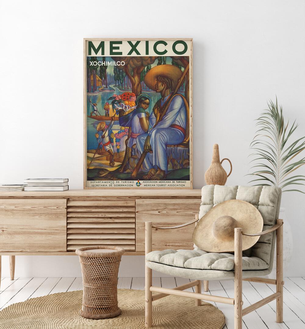 Mexico Retro Vintage Travel Vintage Travel Posters in Oak Wood Plain Frame  in Oak Wood Plain Frame on a console table beside a plant