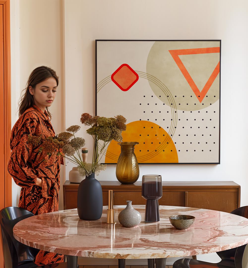 Mid Bauhaus Geometry III By Ana Rut Bre Abstract Art Abstract Paintings in Black Plain Frame placed on a Cream Colored Wall near a Dining Table in the Dining Room 