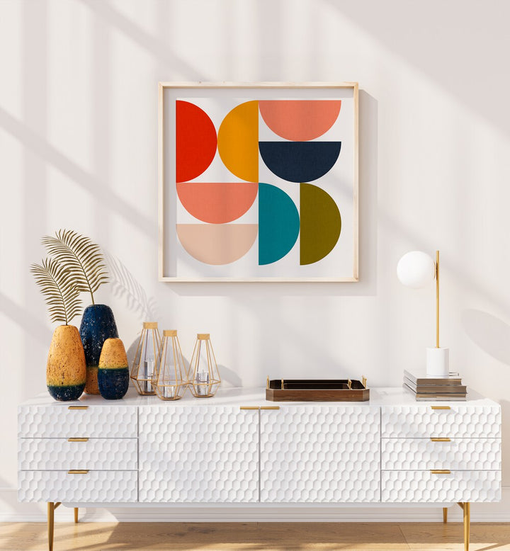 Mid Century Geometric Color Play IV By Ana Rut Bre Abstract Art Abstract Paintings in Oak Wood Plain Frame placed on a White Colored Wall above a Console Table in the Living Room