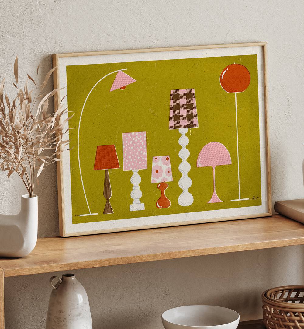 Mid Century Modern Lamps By Julia Leister Wall Art Prints in Oak Wood Plain Frame placed on a table beside a plant