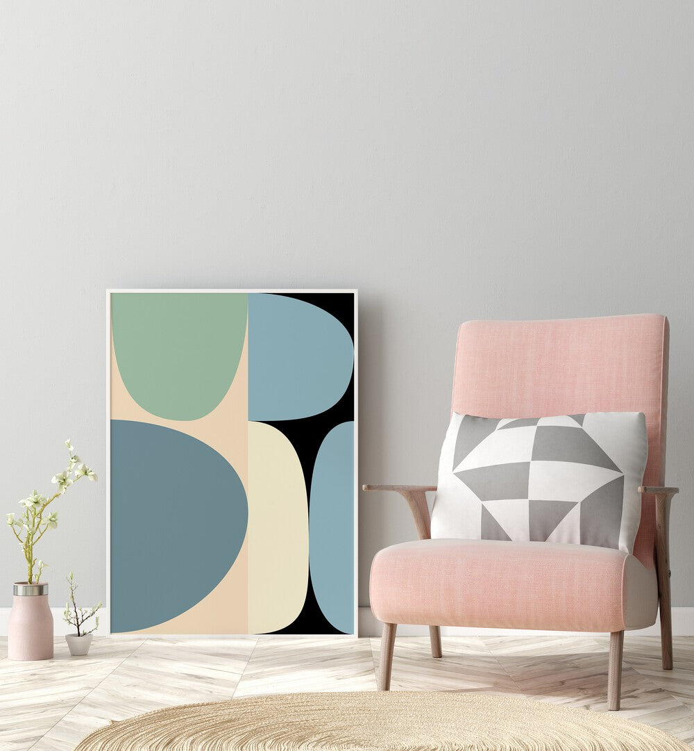 Mid Century Pastel Xvii By Ana Rut Bre Abstract Art Abstract Wall Art in White Plain Frame placed on the floor beside a chair