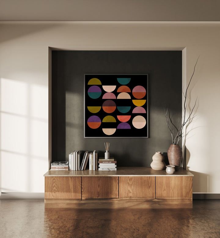 Mid Circles Terracotta Black I By Ana Rut Bre Abstract Art Abstract Paintings in Black Plain Frame placed on a Dark Grey Colored Wall above a Console Table in the Living Room