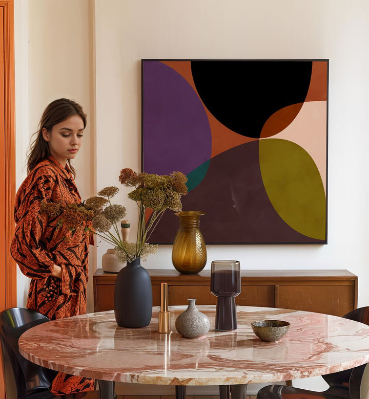 Mid Circles Terracotta Black II By Ana Rut Bre Abstract Art Abstract Paintings in Black Plain Frame placed on a Cream Colored Wall near a Dining Table in the Dining Room