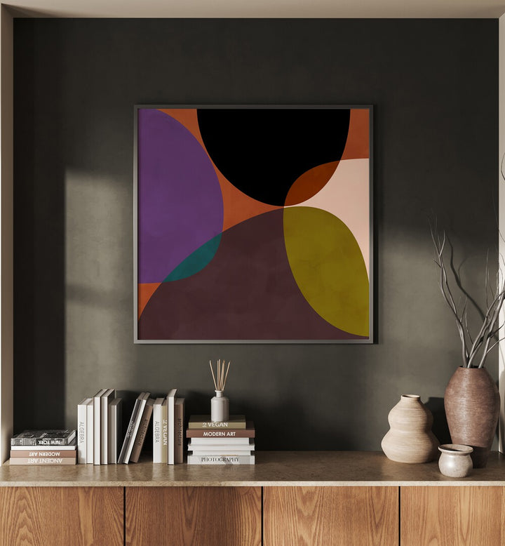 Mid Circles Terracotta Black II By Ana Rut Bre Abstract Art Abstract Paintings in Black Plain Frame placed on a Dark Grey Colored Wall above a Console Table in the Living Room