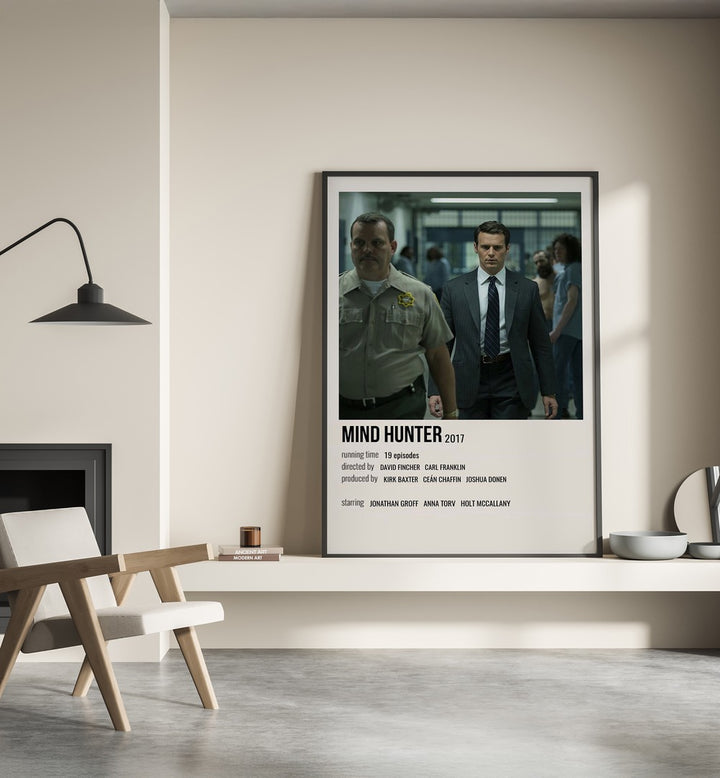 Mind Hunter 2017 Movie Posters in Black Plain Frame place on a wall behind a chair beside lamp