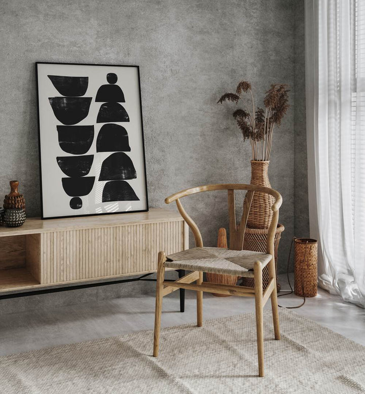 Minimal Plant By Dan Hobday Abstract Art Abstract Paintings in Black Plain Frame placed on a Console Table near a Grey Colored Wall in the Drawing Room