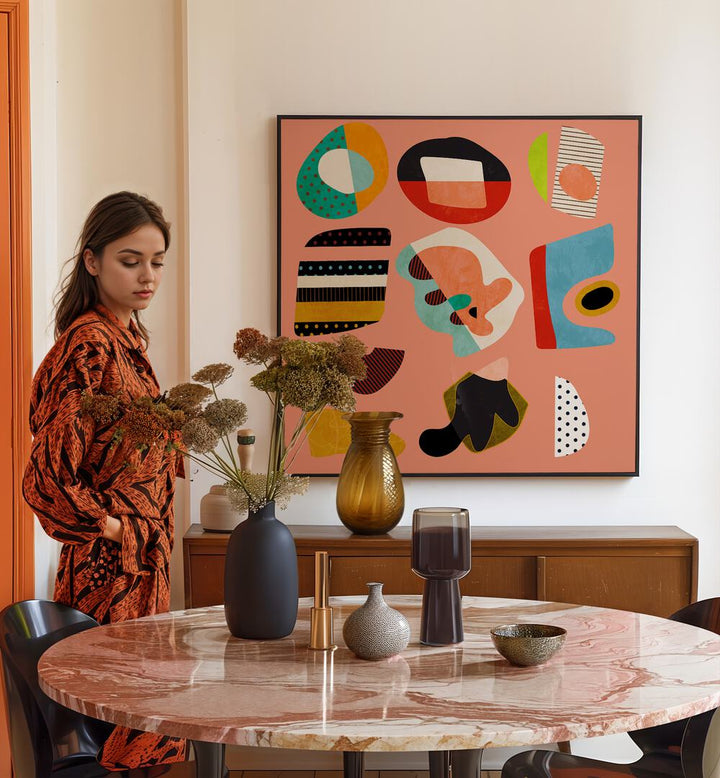 Minimal Shapes Bunte II By Ana Rut Bre Abstract Art Abstract Paintings in Black Plain Frame placed on a Cream Colored Wall near a Dining Table in the Dining Room