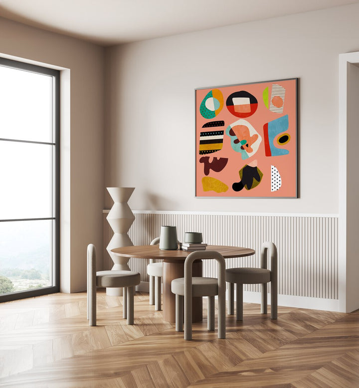 Minimal Shapes Bunte II By Ana Rut Bre Abstract Art Abstract Paintings in Black Plain Frame placed on a Cream Colored Wall near a Dining Table in the Dining Room