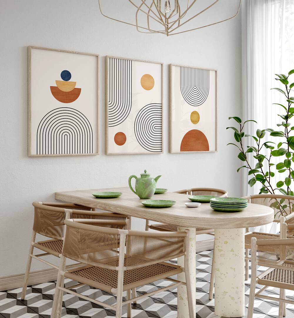 Minimalism Boho Arts Set Of 3 Paintings in Oak Wood Plain Frame placed on a wall behind a dining table and beside a window for dining area