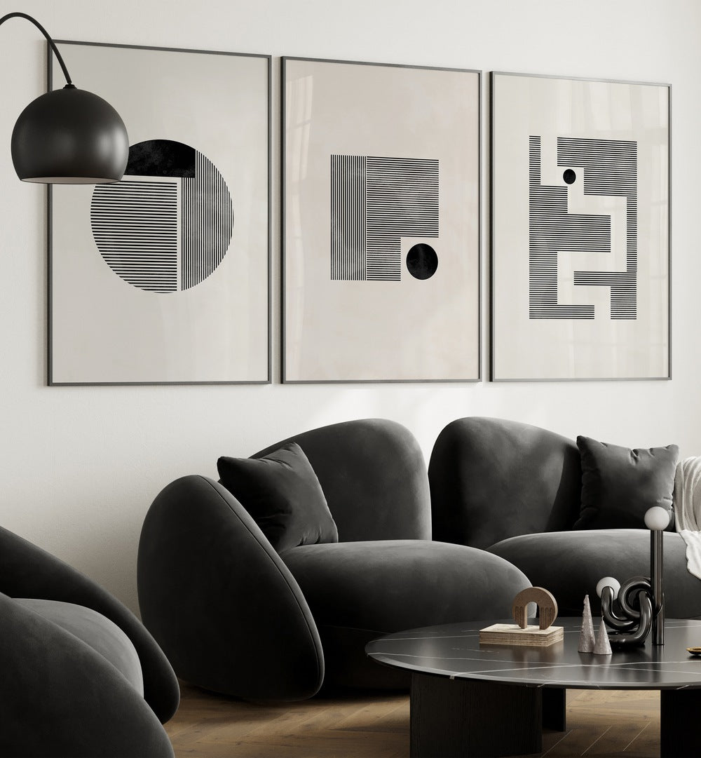 Minimalist Maze Set Set Of 3 Paintings in Black Plain Frame placed on a white wall behind black sofa for living room