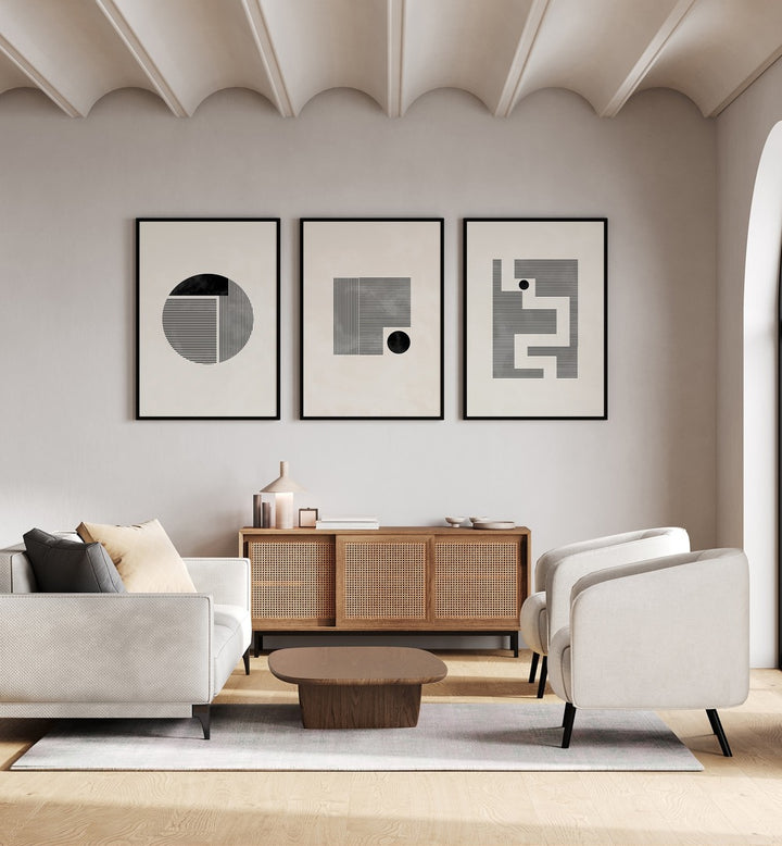 Minimalist Maze Set Set Of 3 Paintings in Black Plain Frame placed on a white wall behind a console table