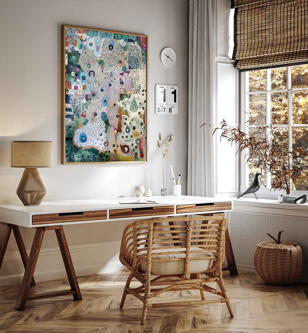 Framed MIRRORS AND SPACE , ABSTRACT PAINTINGS above a sunlit rattan desk in a cozy modern home office.