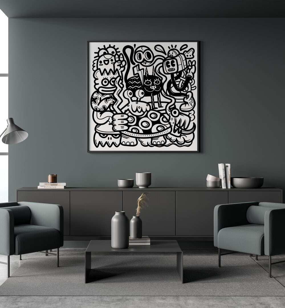 Mischievous Creatures Doodle Art Painting in Black Plain Frame placed on a wall behind a black table