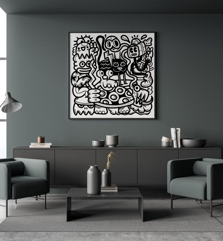 Mischievous Creatures Doodle Art Painting in Black Plain Frame placed on a wall behind a black table