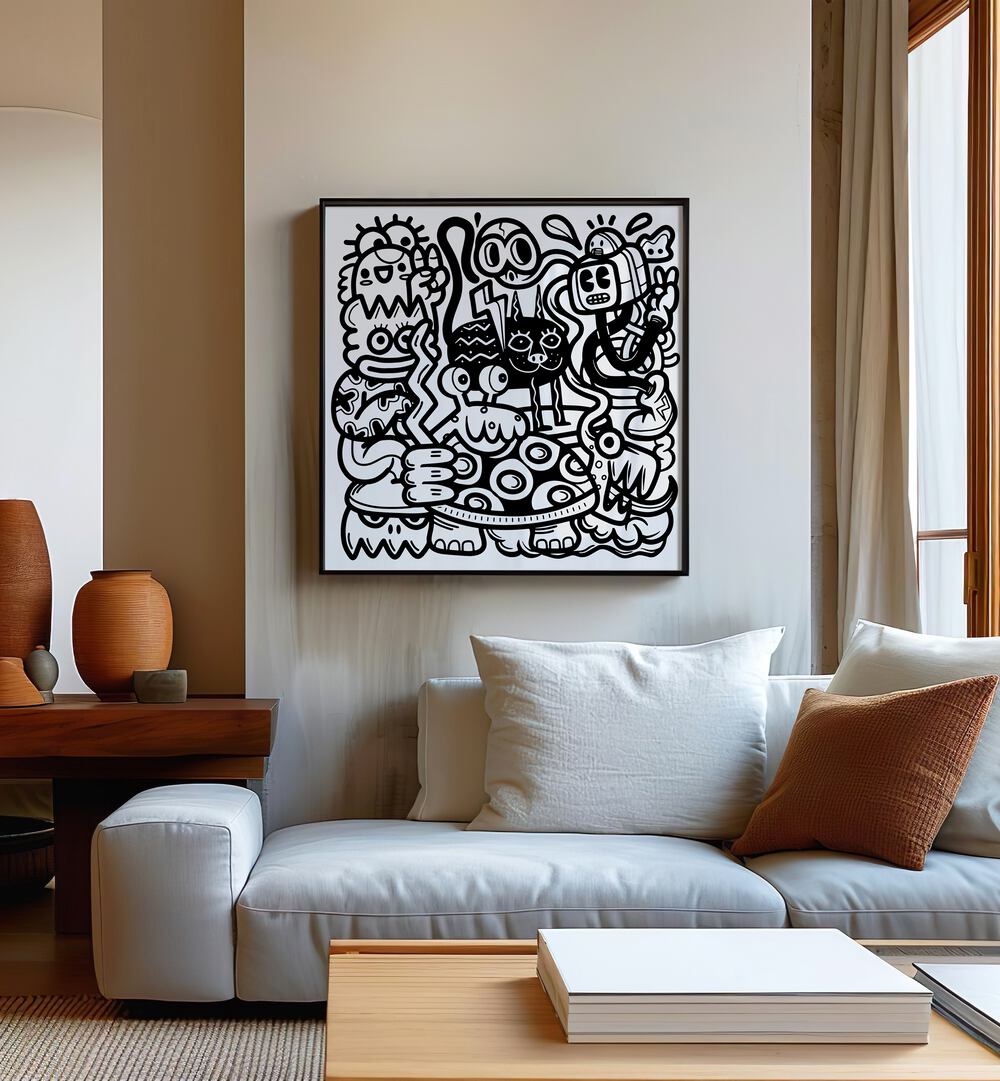 Mischievous Creatures Doodle Art Painting in Black Plain Frame placed on a wall behind a sofa