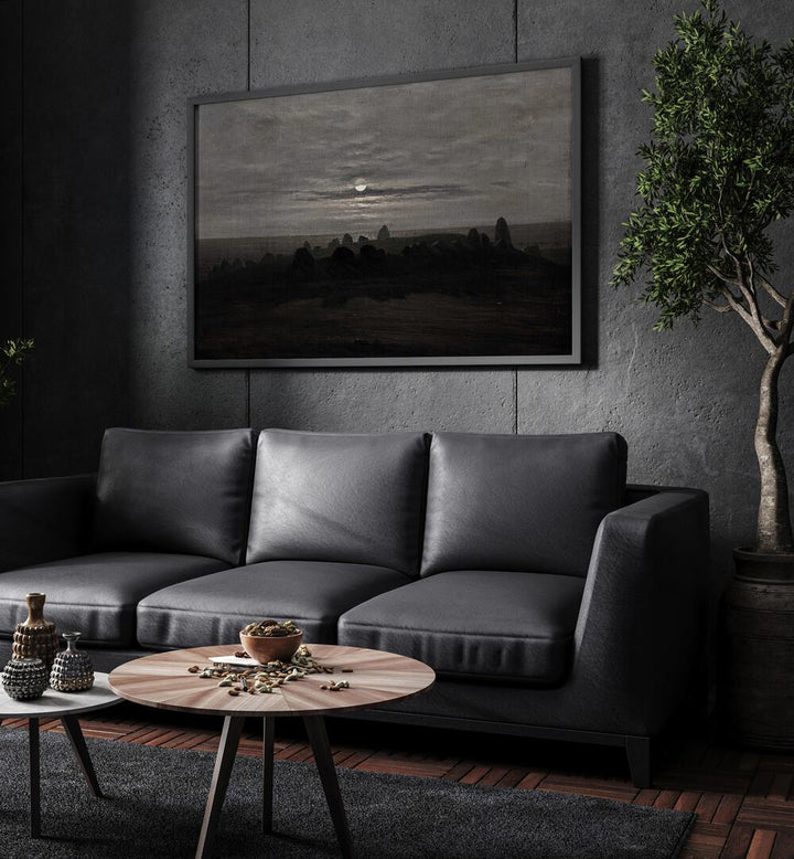 Misty Mourning Gothic Wall Art Prints in Black Plain Frame hanging on a wall above black leather couch beside a plant.