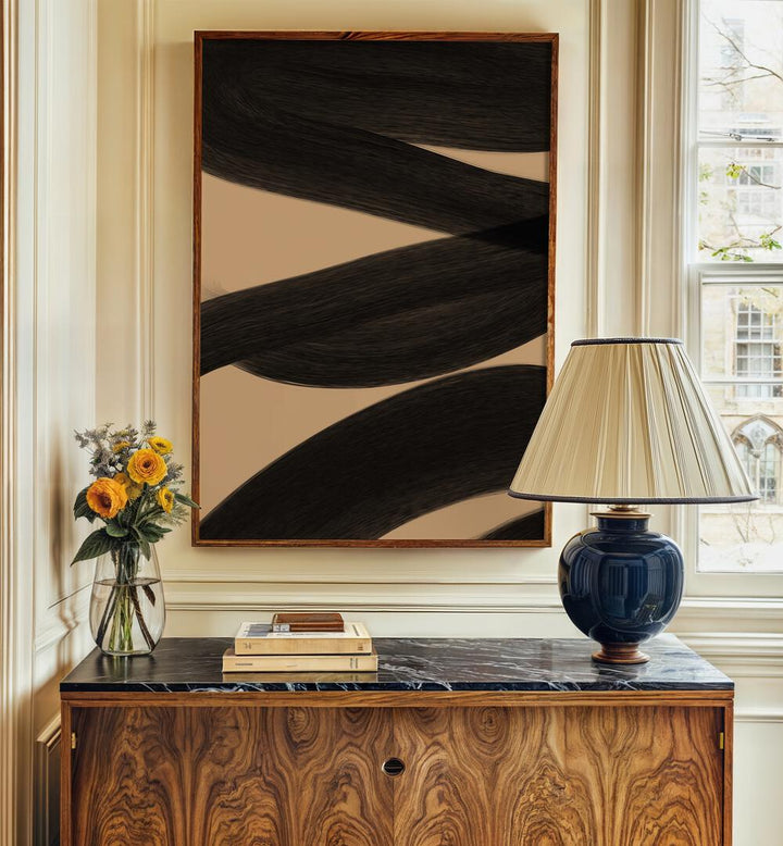 Modern Abstract ii by Yopie Studio Abstract Paintings Abstract Art Prints in Dark Wood Plain Frame placed on a wall beside a window and behind a table