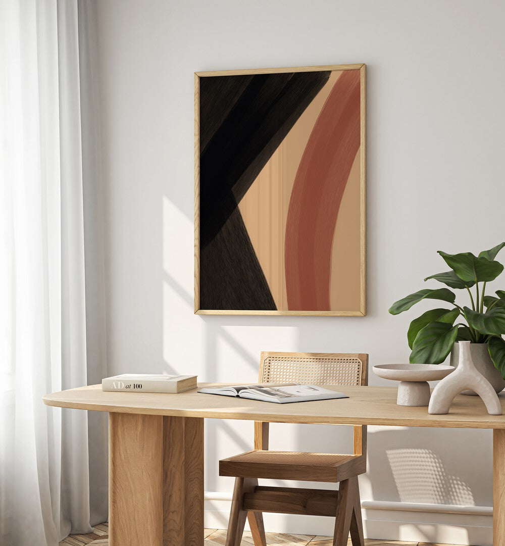 Modern Abstract iii by Yopie Studio Abstract Paintings Abstract Art Prints in Oak Wood Plain Frame placed on a wall beside a window and behind a study table