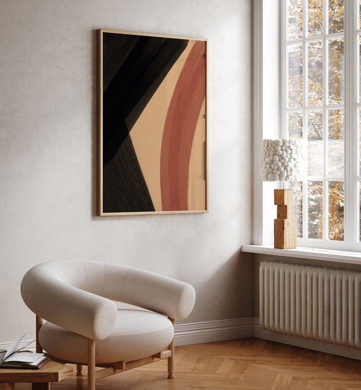 Modern Abstract iii by Yopie Studio Abstract Paintings Abstract Art Prints in Oak Wood Plain Frame placed on a wall in a room beside a window and behind a chair