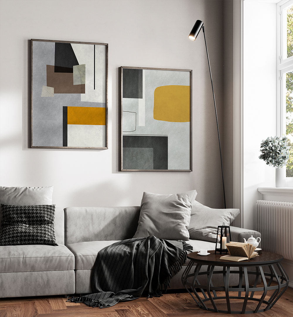 Modern living room with abstract art, gray sofa, and coffee table.