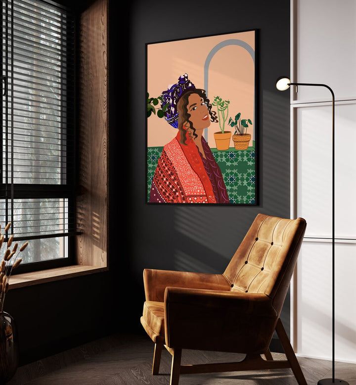 Molamba II by Emel Tunaboylu Women Illustrations paintings in Black Plain Frame placed on a wall beside an orange sofa