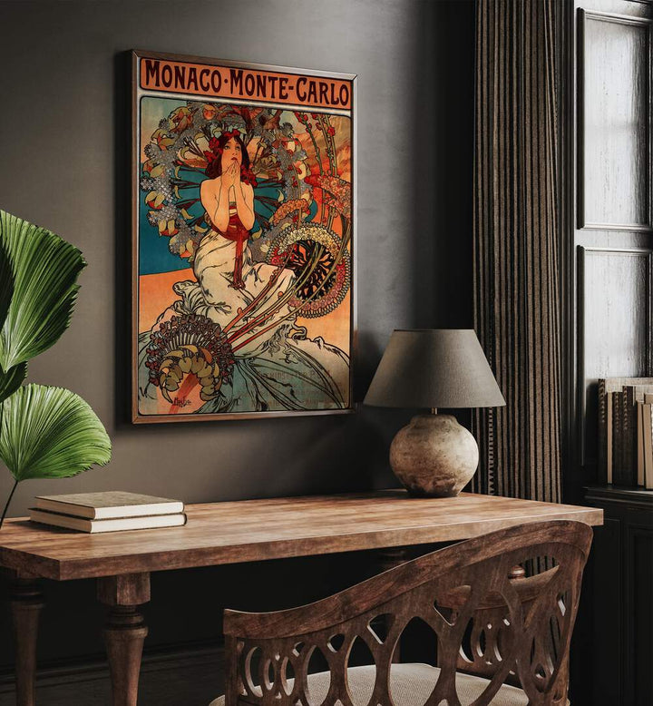 Monaco Monte Carlo  Vintage Travel Posters in Dark Wood Plain Frame placed on a wall behind a study table