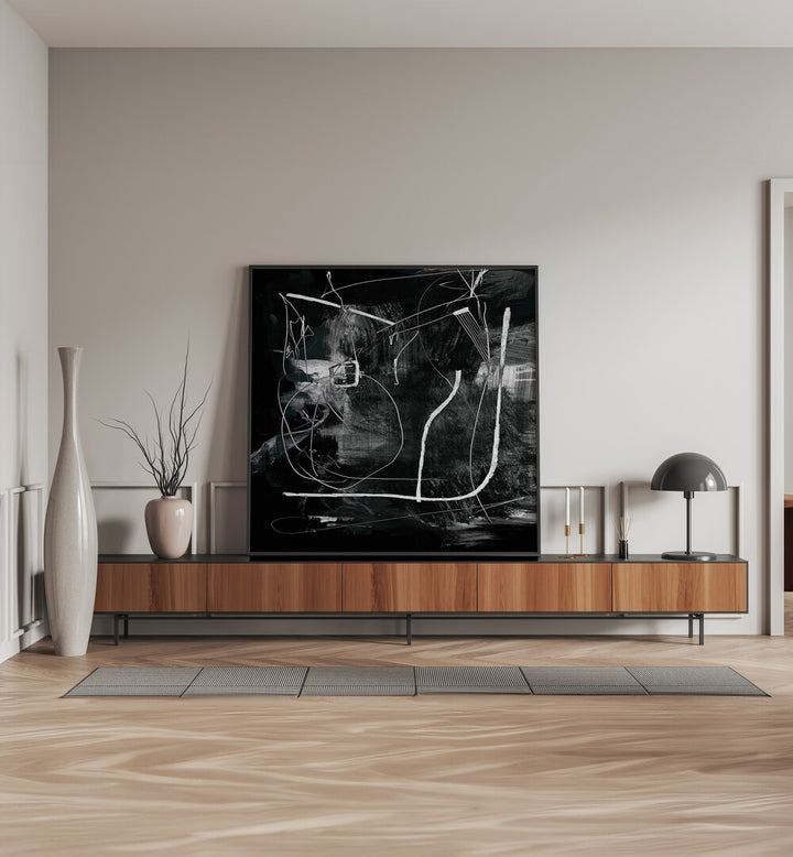 Mono By Dan Hobday Abstract Art Abstract Paintings in Black Plain Frame placed on a Console Table near a Cream Colored Wall in the Drawing Room