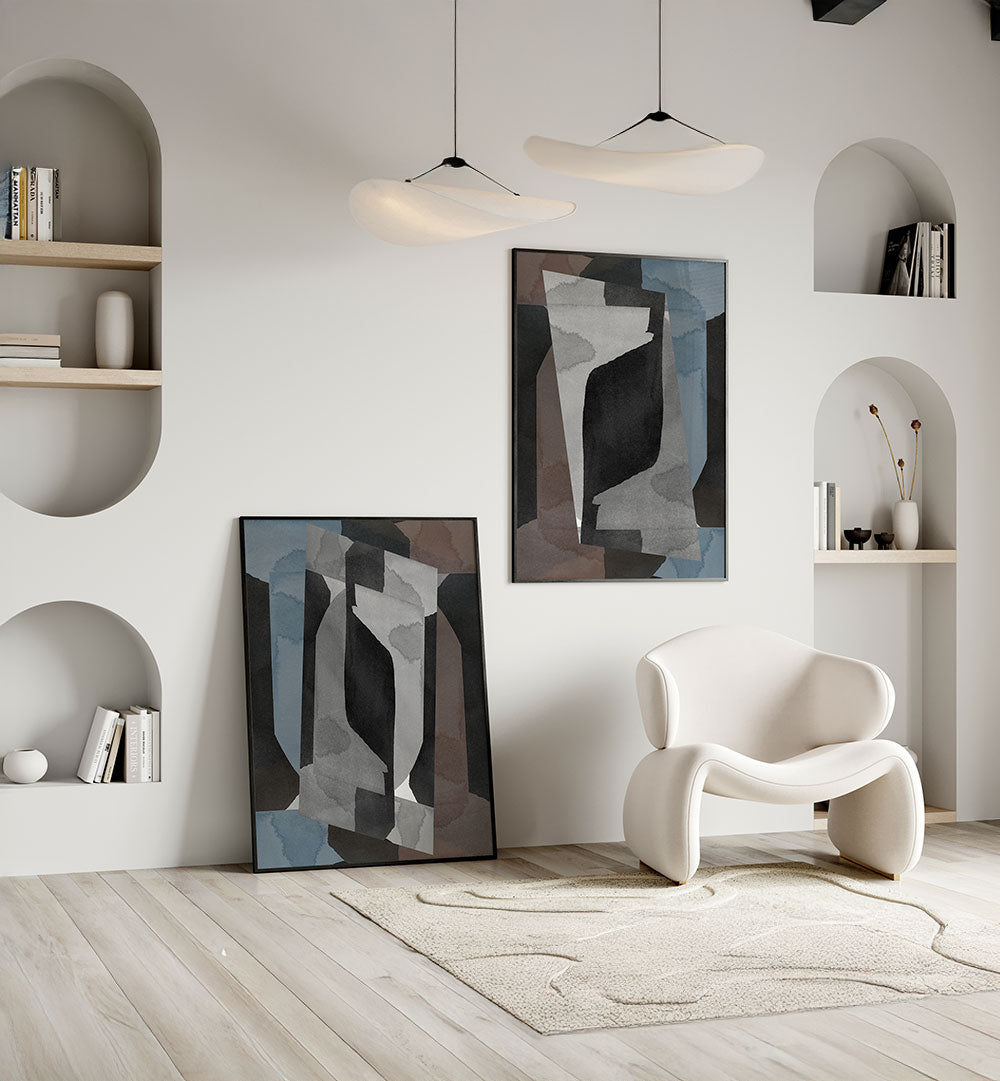 Modern living room with abstract art, a white armchair, and minimal decor.
