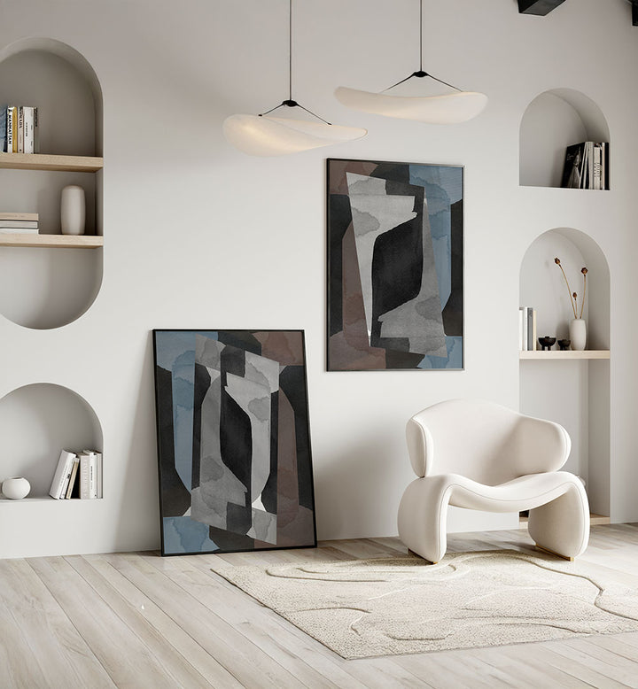 Modern living room with abstract art, a white armchair, and minimal decor.