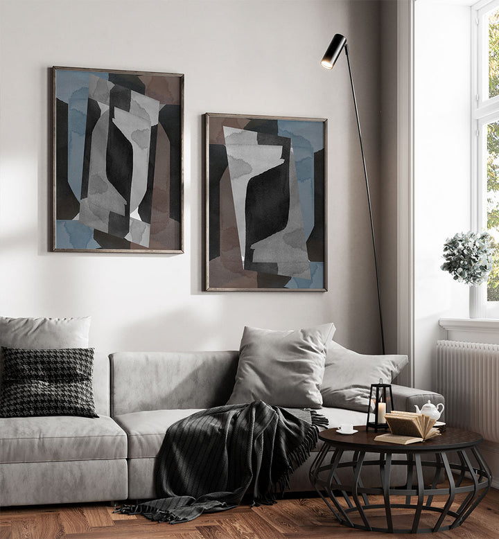 Modern living room with abstract art, gray sofa, and coffee table.