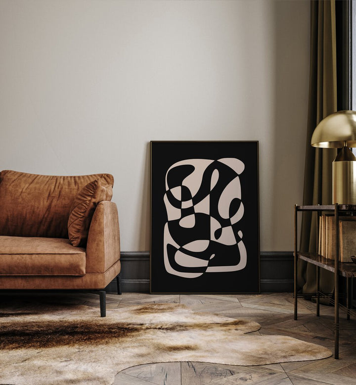 Monochrome Nordic Dreamscape By Preayna Abstract Art Paintings in Black Plain Frame beside a brown sofa