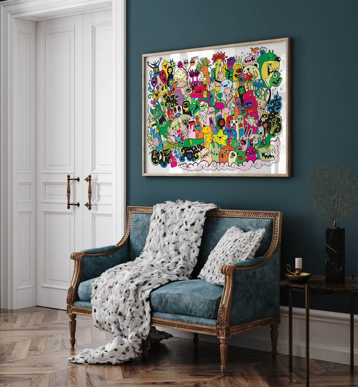 Monster Fun Doodle Art Painting in Oak Wood Plain Frame placed on a wall behind a chair