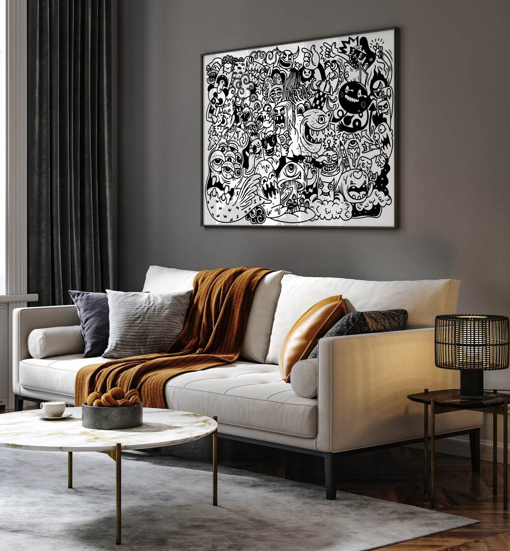 Monster Mayhem Doodle Art Painting in Black Plain Frame placed on wall behind a sofa