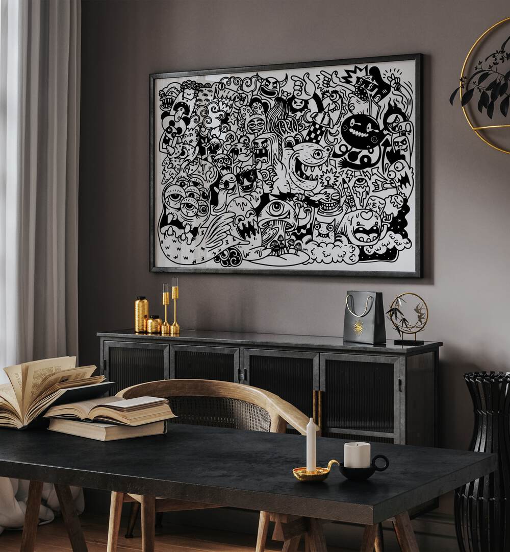 Monster Mayhem Doodle Art Painting in Black Plain Frame placed on wall behind a table