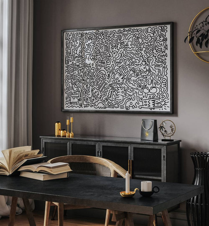 Monster Maze Doodle Art Painting in Black Plain Frame placed on wall behind a table