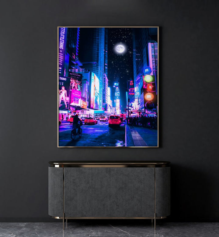 Moon City By Ritvik Takkar Surreal Art Prints in Gold Plain Frame placed on a Dark Grey Colored Wall above a Console Table in the Drawing Room