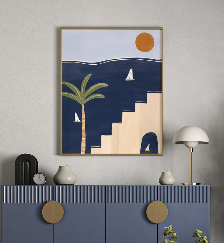 Moracan By Ivy Green Boho Wall Art Paintings in Oak Wood Plain Frame on a wall above a console table