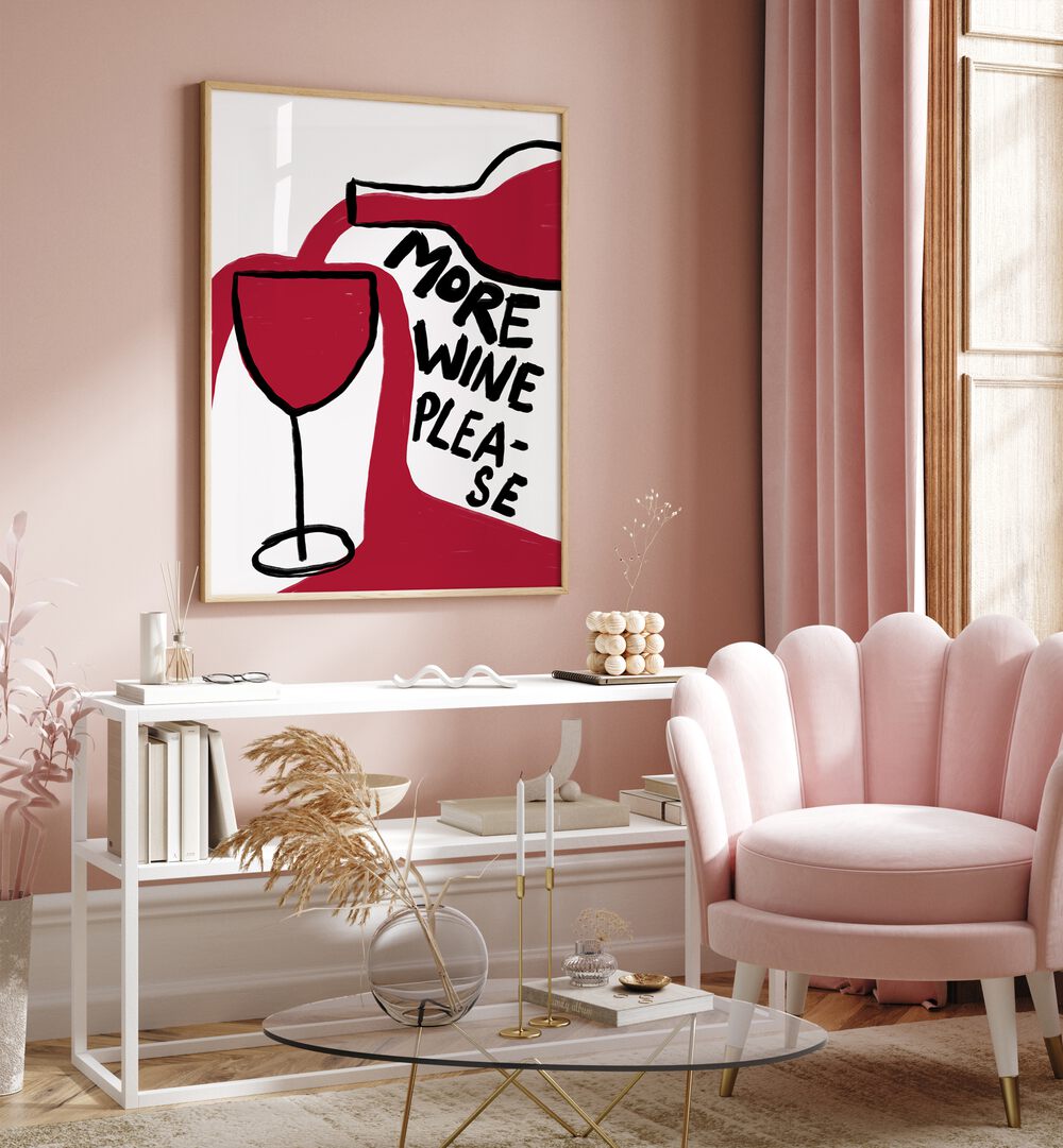 More Wine Please by Athene Fritsch Cafe Art Prints Cafe Posters in Oak Wood Plain Frame placed on a pink wall beside a window and behind a table