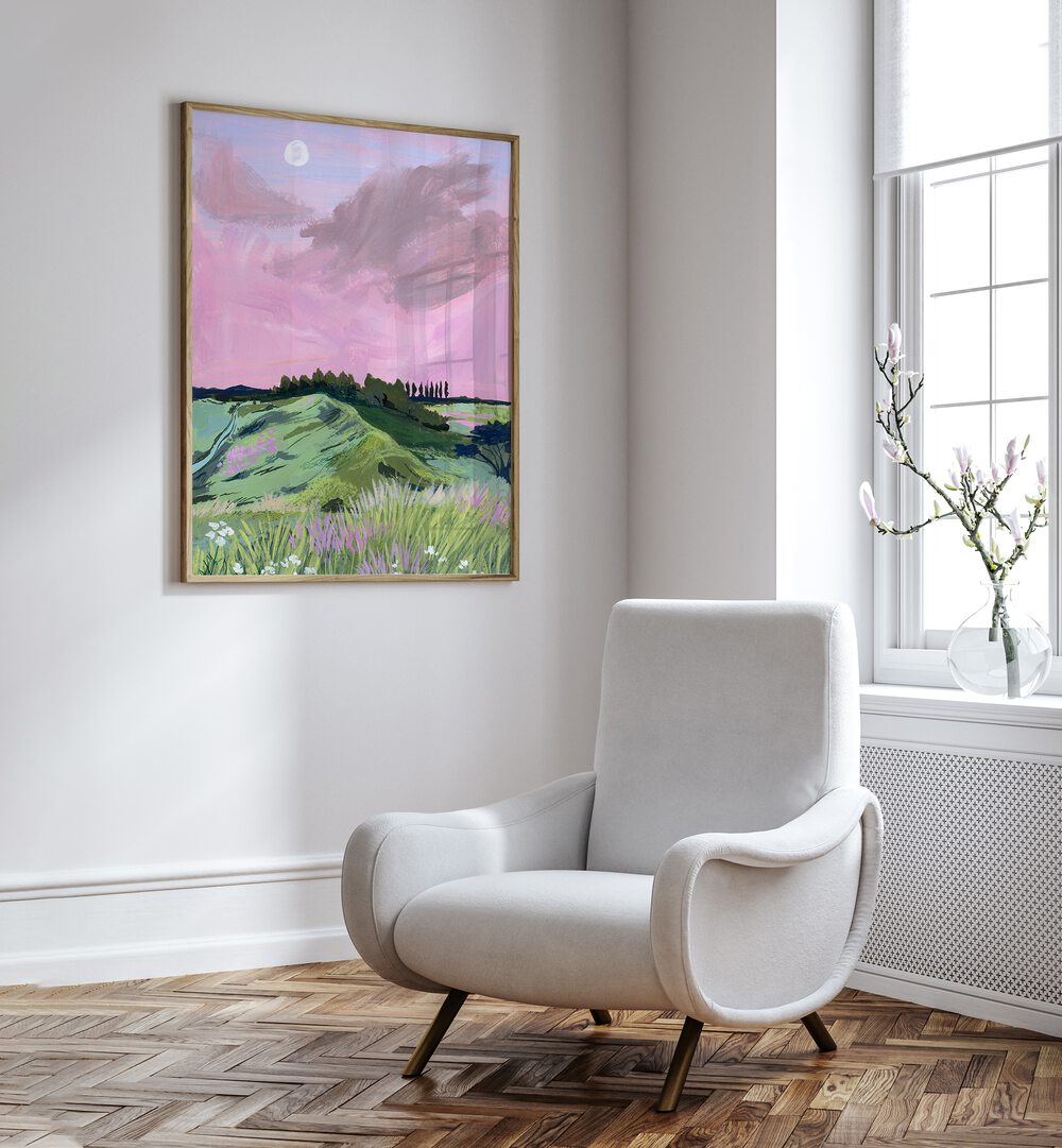 Morning Calm By Sarah Gesek Landscape Art Prints in Oak Wood Plain Frame placed on a white wall beside a chair and a window