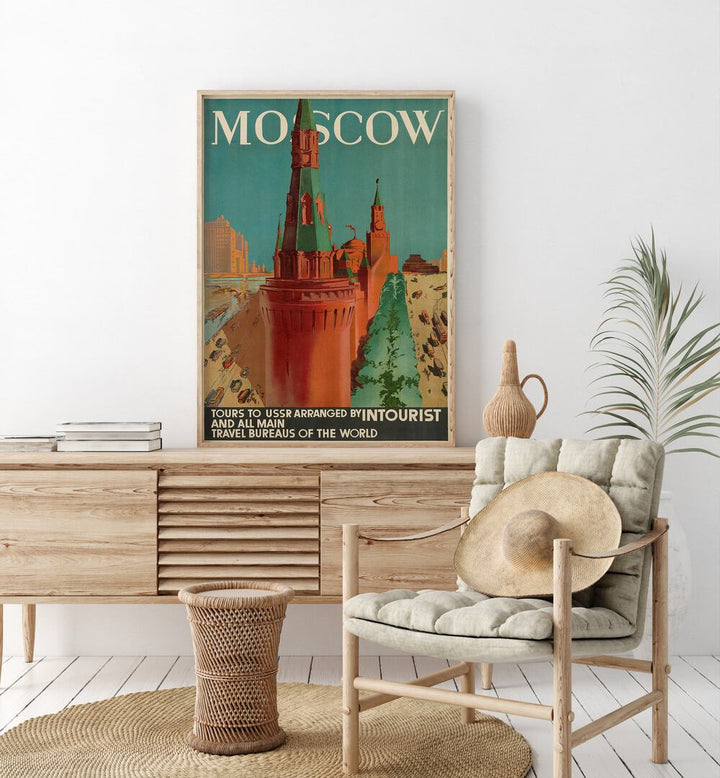 Moscow Retro Vintage Travel Vintage Travel Posters in Oak Wood Plain Frame on a console table beside a plant