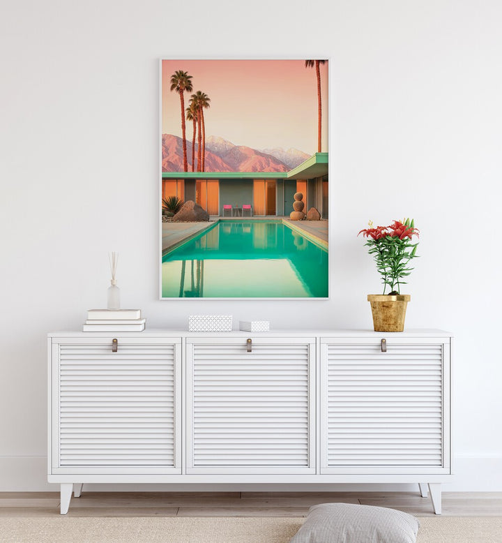 MOTEL 66 PALM SPRINGS, BEACH PAINTINGS showcase mid-century charm with a serene pool and stunning mountain backdrop.