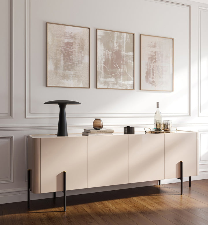 Elegant NORDIC SNOW SET, SET OF 3 PAINTINGS enhancing a stylish living space with serene winter landscapes.