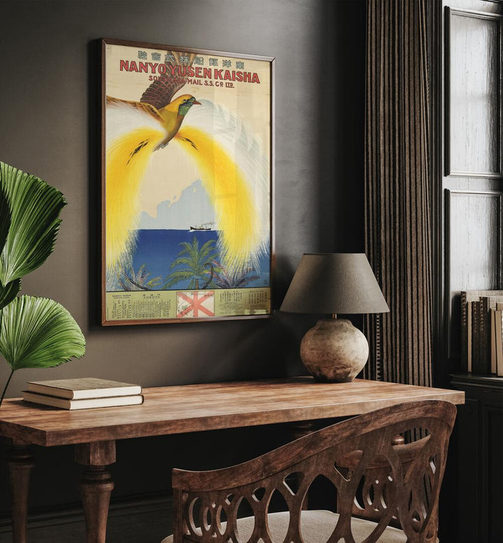 Nanyo Yusen Kaisha Retro Vintage Travel Vintage Travel Posters in Dark Wood Plain Frame on a wall above a study table beside a plant