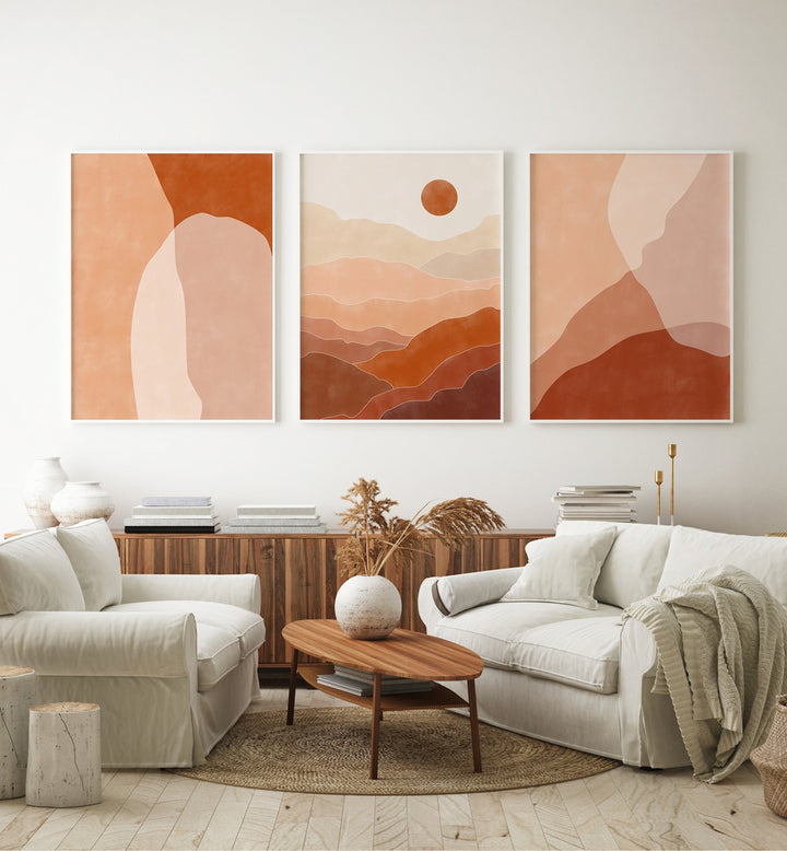 Nature Escapes Set Of 3 Paintings in White Plain Frame placed on a white wall behind a console table for living room