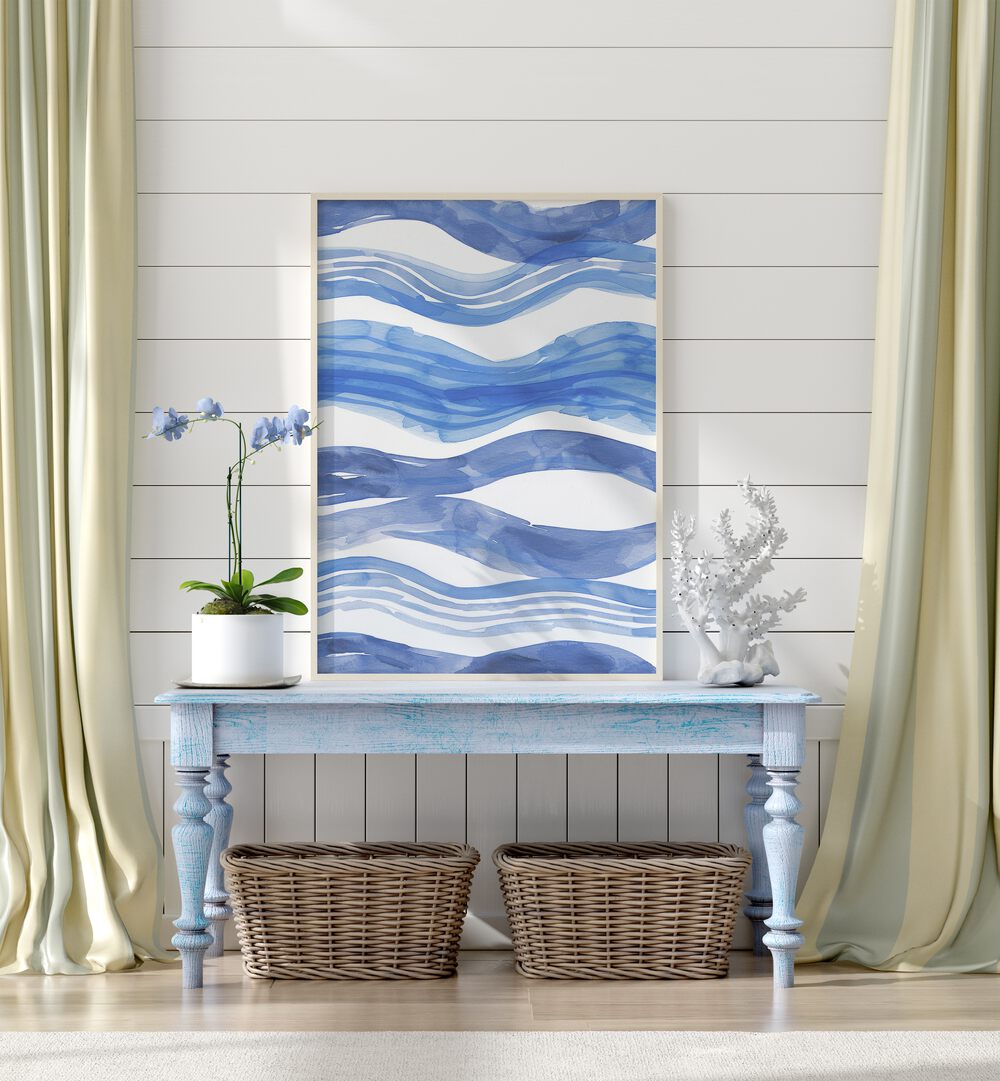 Nautical Notes V Beach Prints Coastal Wall Art in White Plain Frame placed on a blue table beside a a plant and a show piece