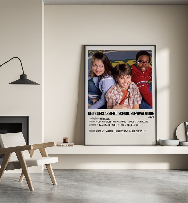 Neds Declassified School Survival Guide 2004 Movie Posters in Black Plain Frame place on a wall behind a chair beside lamp