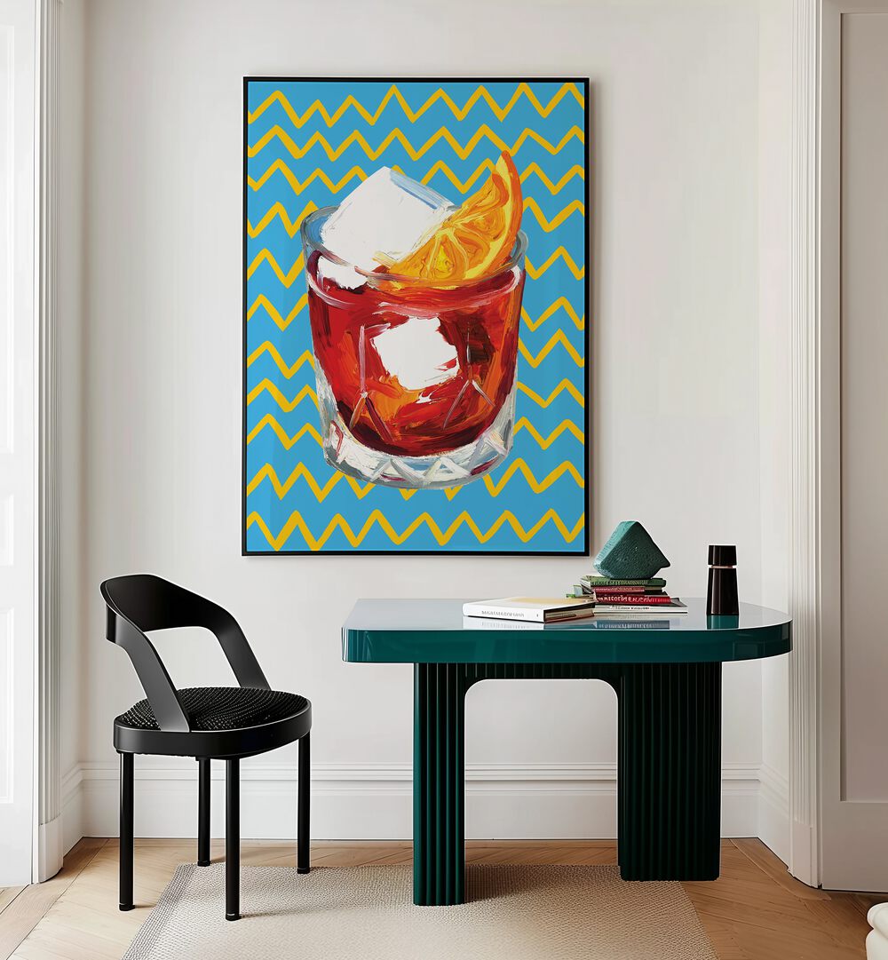 Negroni Blue by Alice Straker Bar Posters Bar Art Prints in Black Plain Frame placed on a wall behind a study table