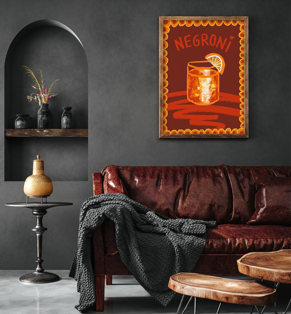 Negroni by Studio Dolci Kitchen Art Prints in Oak Wood Plain Frame placed on a wall behind a sofa