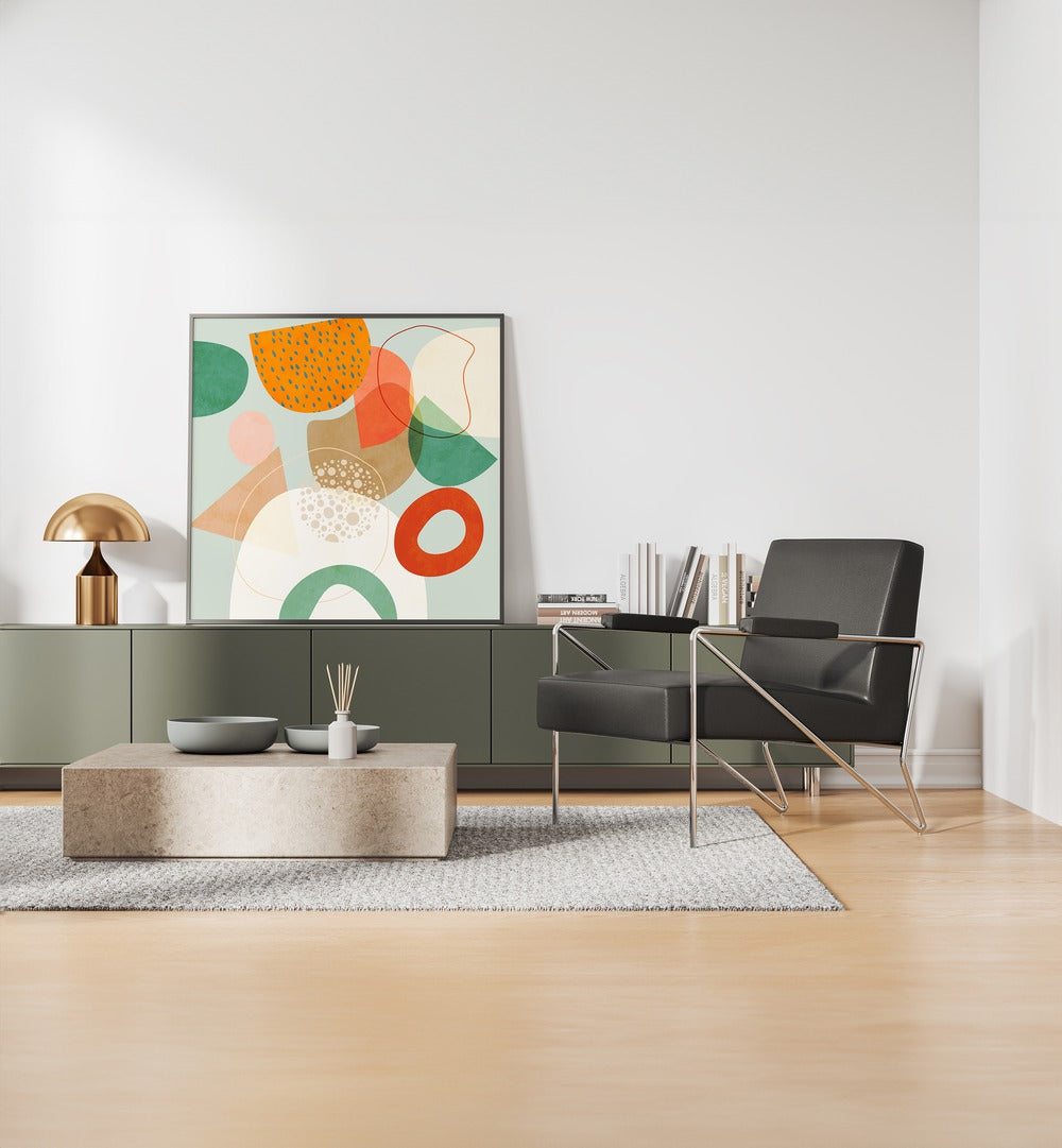 New Shapes Play IV By Ana Rut Bre Abstract Art Abstract Paintings in Black Plain Frame placed on a Console Table near a White Colored Wall in the Drawing Room