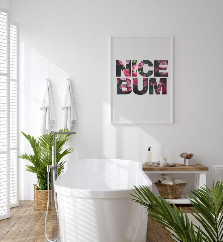 Nice Bum By Sarah Manovski Quotes and Typography Poster in White Plain Frame placed on a white wall behind a white tub for bathroom